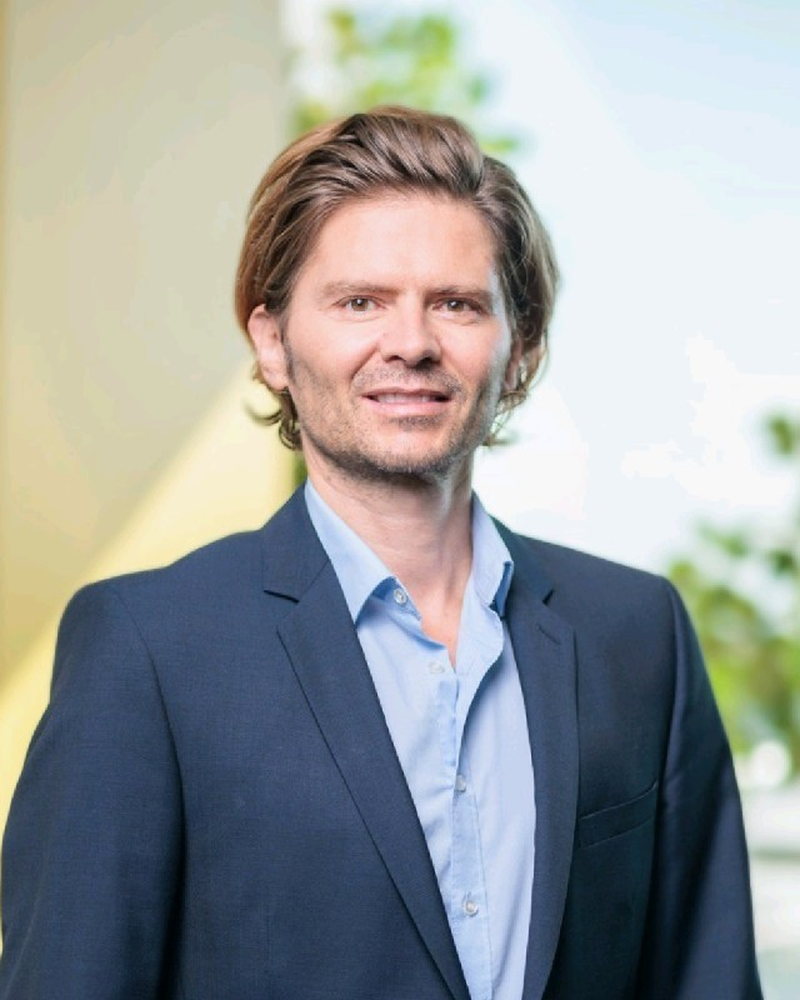 Porträt von Alexander Huber, Co-Founder und Managing Partner von ABD AI