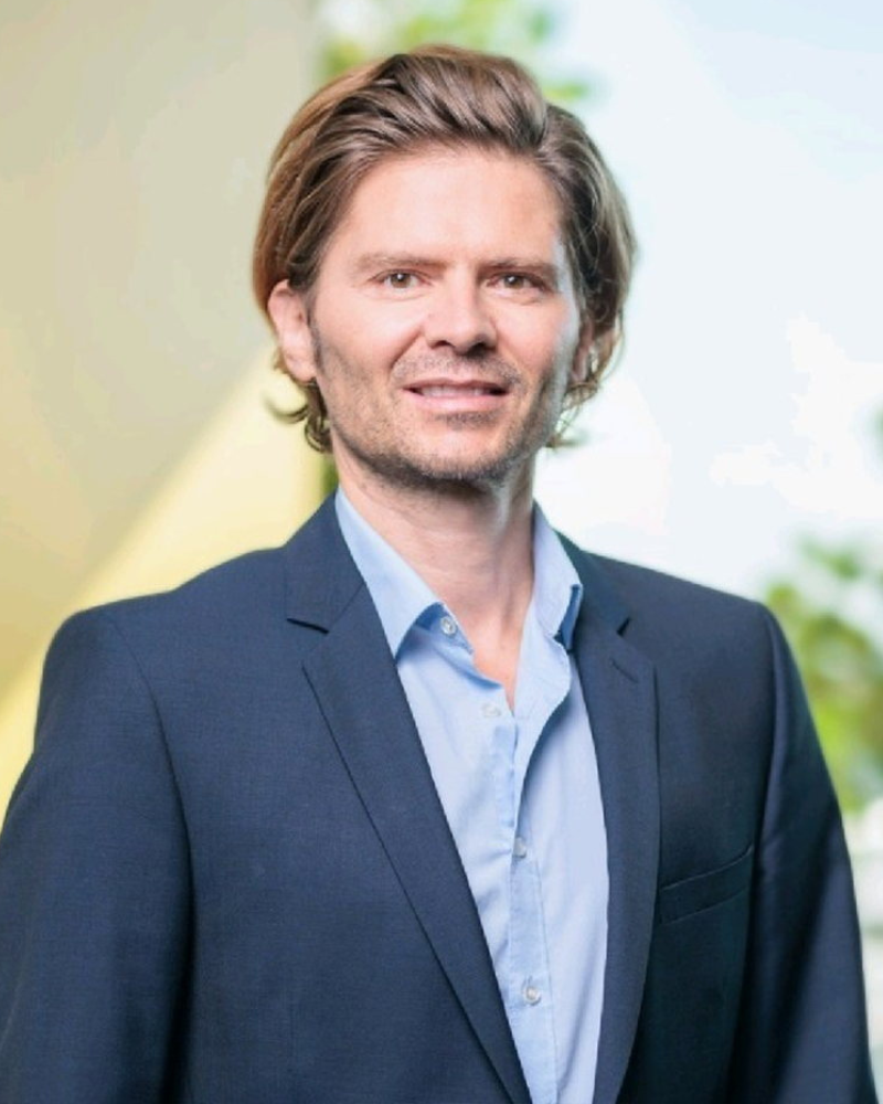 Porträt von Alexander Huber, Co-Founder und Managing Partner von ABD AI